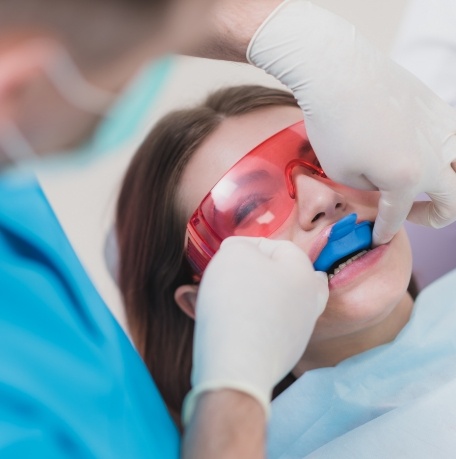 Child receiving fluoride treatment