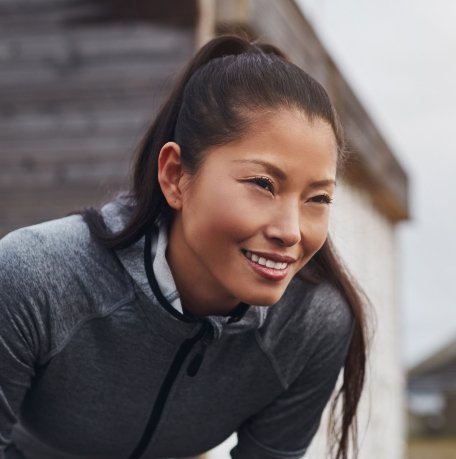 Woman with beautiful smile thanks to cosmetic dentistry