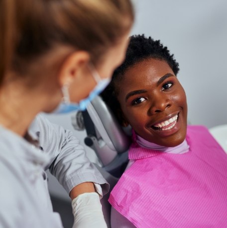 Dental patient smiling during a dental checkup