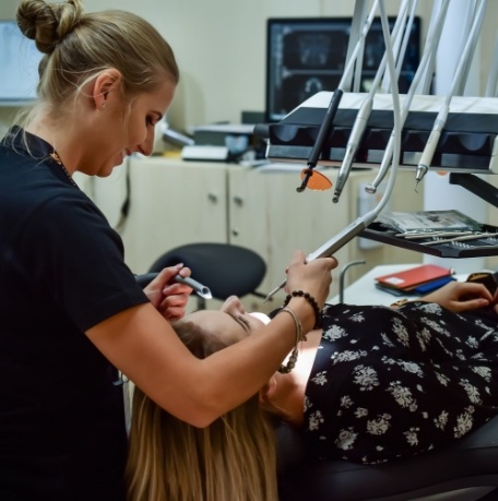 Dental team member providing a professional teeth cleaning