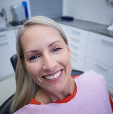 Woman with dentures smiling