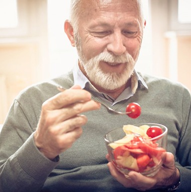 Dentures patient in Soldotna eating