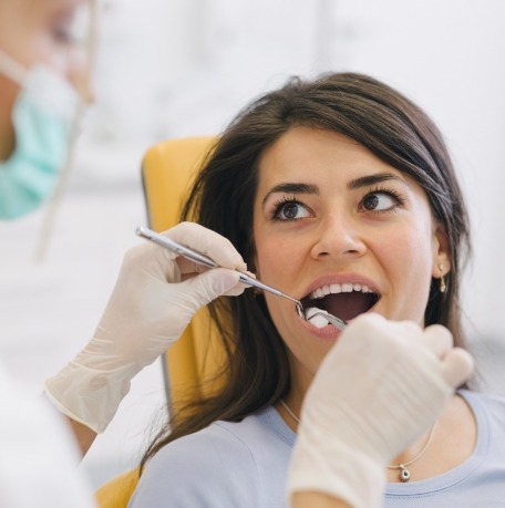 Dentist extracting a tooth