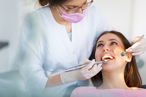 patient talking to their dentist